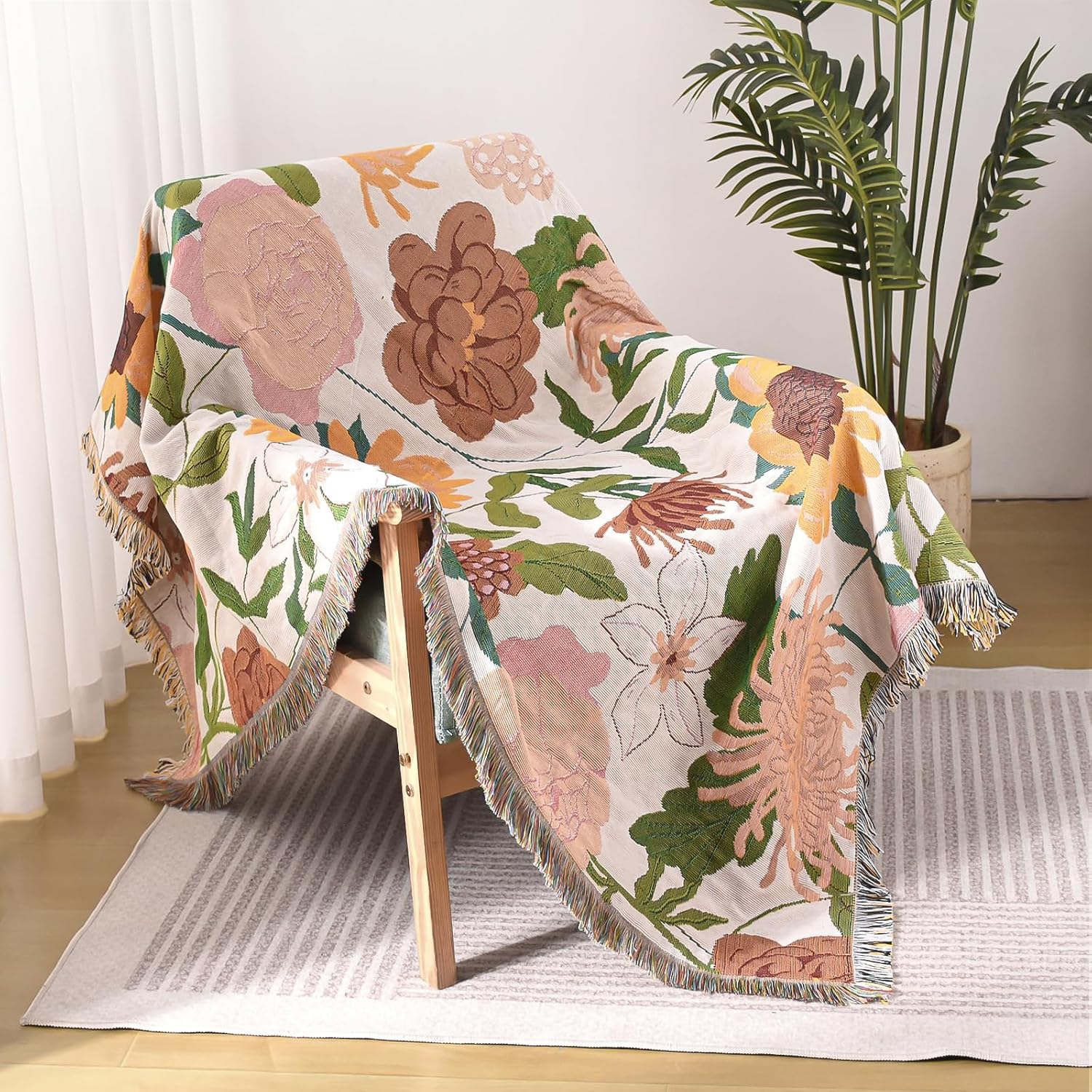 Yellow floral throw with tassels