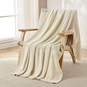 Cream white chunky cable-knit throw